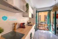 A kitchen or kitchenette at SkySea Holidays CITY CENTER SUITES