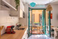 A kitchen or kitchenette at SkySea Holidays CITY CENTER SUITES