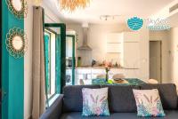 A kitchen or kitchenette at SkySea Holidays CITY CENTER SUITES