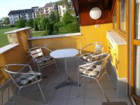 A balcony or terrace at Birdland Panorama Apartman