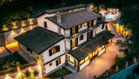 an aerial view of a large house with lights at Villa Lara in Tortorici