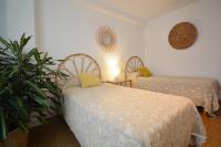 Postel nebo postele na pokoji v ubytování Precioso apartamento de playa en Sanxenxo