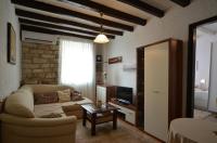 Telewizja i/lub zestaw kina domowego w obiekcie Apartment ALESSIA