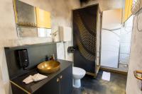 a bathroom with a sink and a toilet at Timeout Heritage Hotel Zagreb in Zagreb
