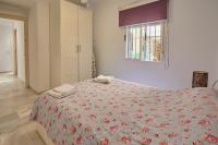 A bed or beds in a room at Two Bedrooms Leonor Davalos 2