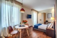 Posteľ alebo postele v izbe v ubytovaní Milhouse Suites Duomo