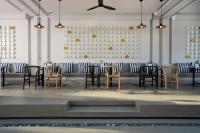 a restaurant with chairs and tables in a room at Meliá Phuket Mai Khao in Mai Khao Beach