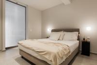 Posteľ alebo postele v izbe v ubytovaní Marvelous 2BR Apartments with balcony by UPSTREET