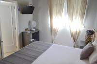 Postel nebo postele na pokoji v ubytování Hotel Alda Estación Vigo