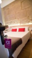 Postel nebo postele na pokoji v ubytování Hotel Alda Estación Vigo