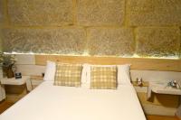 Postel nebo postele na pokoji v ubytování Hotel Alda Estación Vigo
