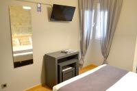 TV a/nebo společenská místnost v ubytování Hotel Alda Estación Vigo