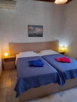 Postel nebo postele na pokoji v ubytování Coral Villas