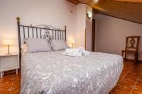 Cama o camas de una habitación en Apartamentos Cudillero