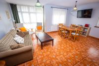 Zona de estar de Apartamentos Cudillero