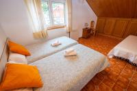 Cama o camas de una habitación en Apartamentos Cudillero
