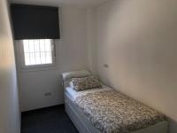 A bed or beds in a room at La Casita