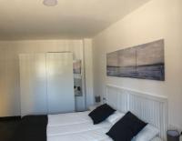 A bed or beds in a room at La Casita