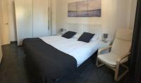 A bed or beds in a room at La Casita