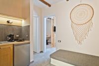 Kuchyň nebo kuchyňský kout v ubytování Ypsilos Beach Suites Adults Only