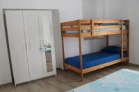 Łóżko lub łóżka w pokoju w obiekcie Damy Sea House