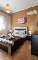 Posteľ alebo postele v izbe v ubytovaní Olive tree Apartment