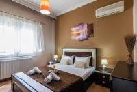 Posteľ alebo postele v izbe v ubytovaní Olive tree Apartment