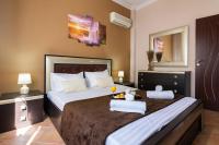 Posteľ alebo postele v izbe v ubytovaní Olive tree Apartment