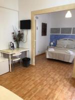TV a/nebo společenská místnost v ubytování Hotel Horizonte