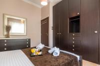 Posteľ alebo postele v izbe v ubytovaní Olive tree Apartment