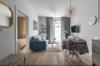 TV a/nebo společenská místnost v ubytování Apartament Wenecja Błękitna - Młyn Maria - Art Apartments