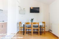 TV a/nebo společenská místnost v ubytování Beautiful Sea View Apartments - Niko Čeko