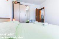Postel nebo postele na pokoji v ubytování Beautiful Sea View Apartments - Niko Čeko