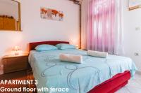 Postel nebo postele na pokoji v ubytování Beautiful Sea View Apartments - Niko Čeko