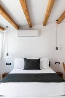 Posteľ alebo postele v izbe v ubytovaní Ryous Mykonos