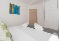 Posteľ alebo postele v izbe v ubytovaní Apartments Moon