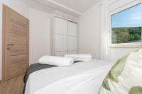 Posteľ alebo postele v izbe v ubytovaní Apartments Moon