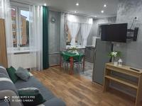 Telewizja i/lub zestaw kina domowego w obiekcie Silver Apartment Mazury Giżycko