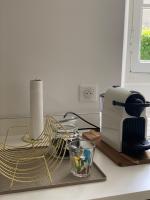 a kitchen counter with a toaster and a toaster at Lou Mut in Lectoure