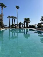 Bazén v ubytovaní Ixia Dream hotel - Adults only alebo v jeho blízkosti