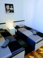 Posteľ alebo postele v izbe v ubytovaní zPula Center Studio Apartments