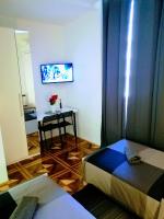 Televízia a/alebo spoločenská miestnosť v ubytovaní zPula Center Studio Apartments
