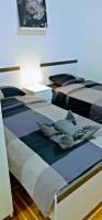 Posteľ alebo postele v izbe v ubytovaní zPula Center Studio Apartments