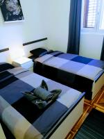 Posteľ alebo postele v izbe v ubytovaní zPula Center Studio Apartments