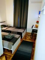 Posteľ alebo postele v izbe v ubytovaní zPula Center Studio Apartments