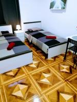 Posteľ alebo postele v izbe v ubytovaní zPula Center Studio Apartments