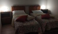 A bed or beds in a room at B&B CASETTA 42