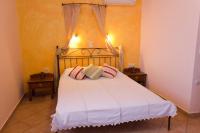 Posteľ alebo postele v izbe v ubytovaní Διαμέρισμα 4 ατόμων-Cozy Family apartment close to the most beautiful beaches