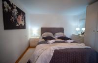 Posteľ alebo postele v izbe v ubytovaní Art Apartment Sole