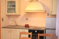 Kuchyňa alebo kuchynka v ubytovaní Διαμέρισμα 4 ατόμων-Cozy Family apartment close to the most beautiful beaches
